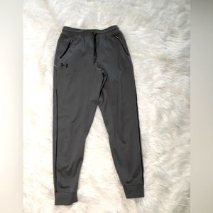 Boys Under Armour athletic pants with front pocket.  Good condition.